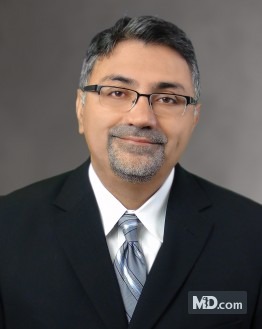 Photo of Dr. Kevin M. Comar, MD